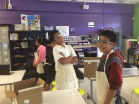 Students posing in a science class